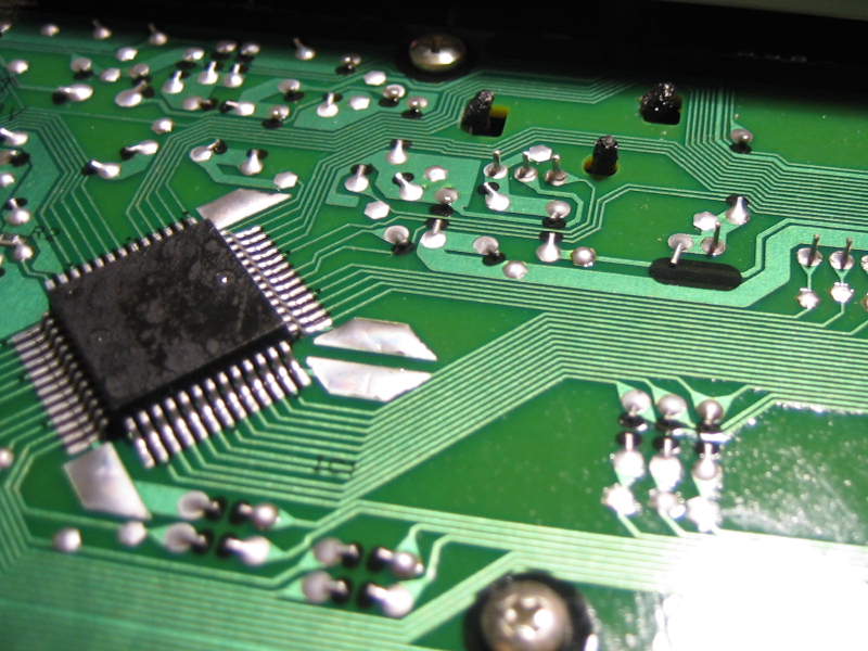 Image of bad solder joints with near by IC